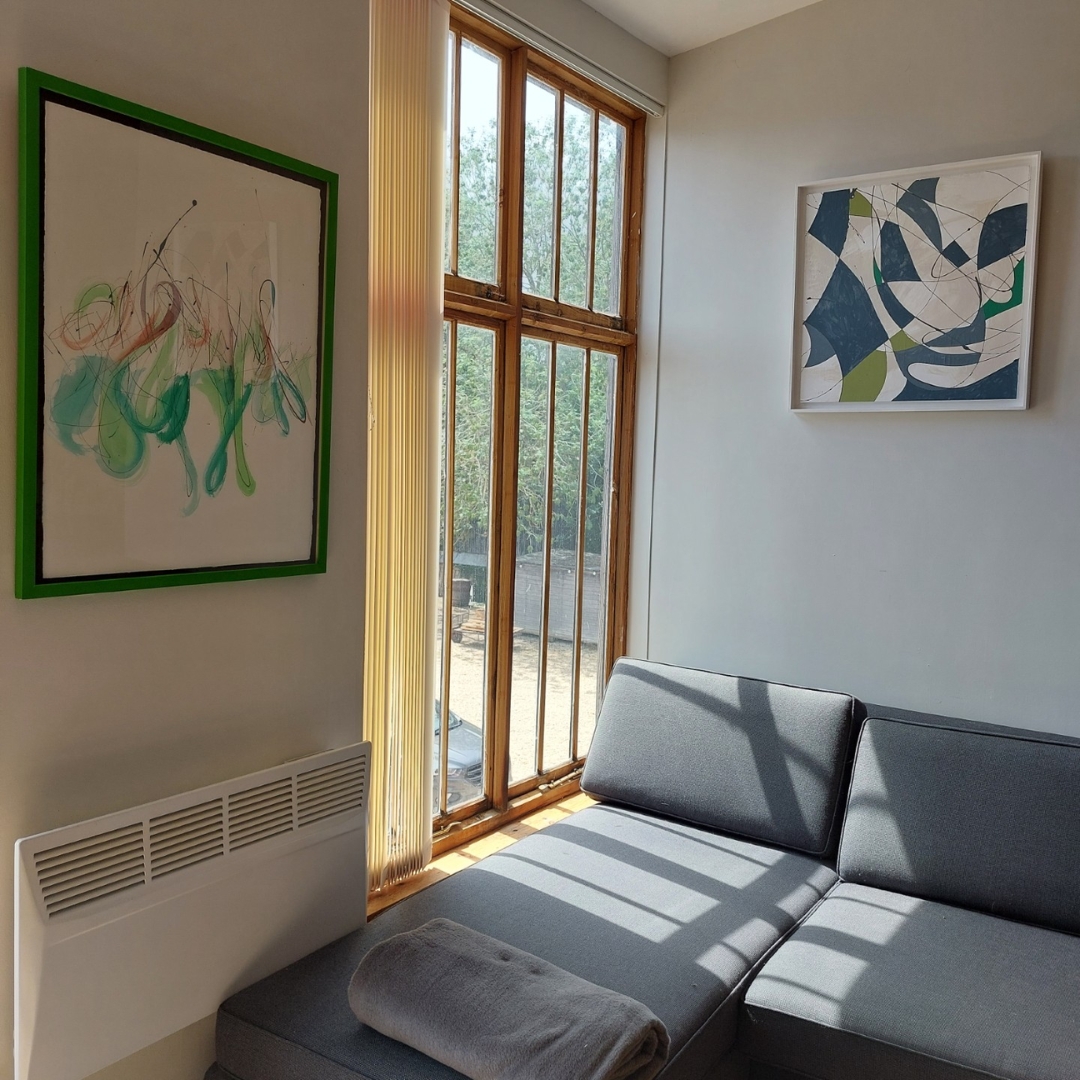Emily Jolley Work at the Retreat 1 Emily Jolley Paintings hung on the wall at The Retreat
