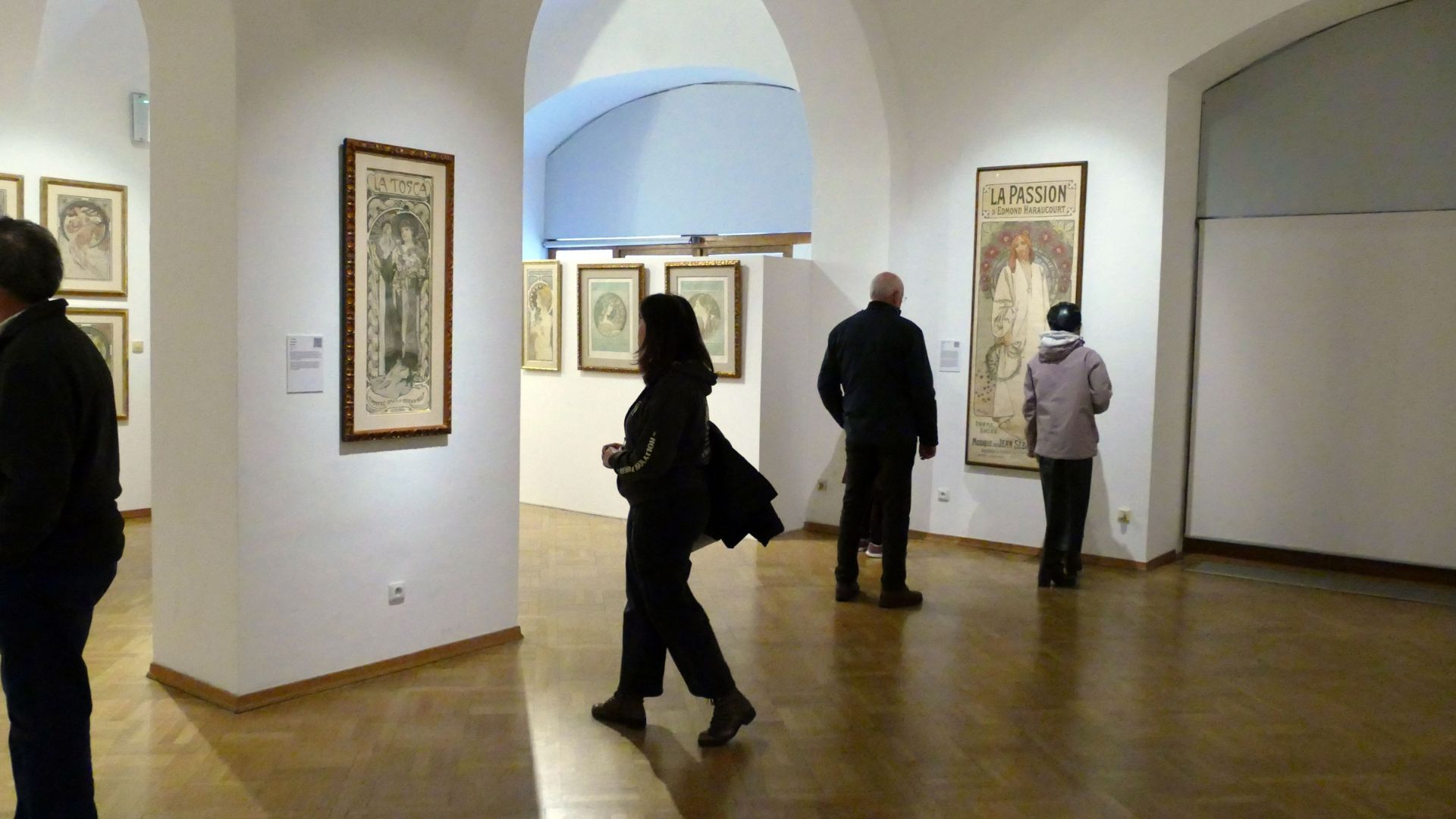 Visitors viewing artwork in a contemporary art gallery